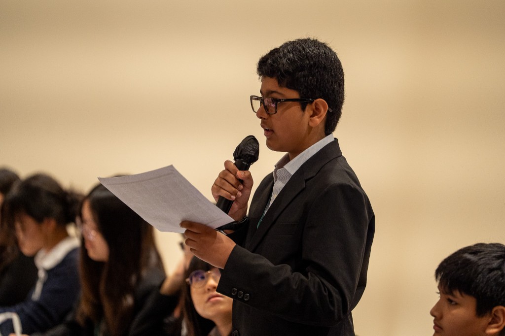Student delegate delivering speech